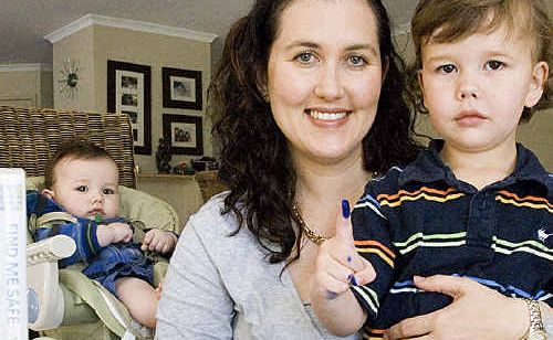 Toowoomba mother-of-five Deanne Wilson fingerprints her three-year-old son Clancy. She has bought identification kits for her children including baby Finnley (left). Toowoomba mother-of-five Deanne Wilson fingerprints her three-year-old son Clancy. She has bought identification kits for her children including baby Finnley (left).